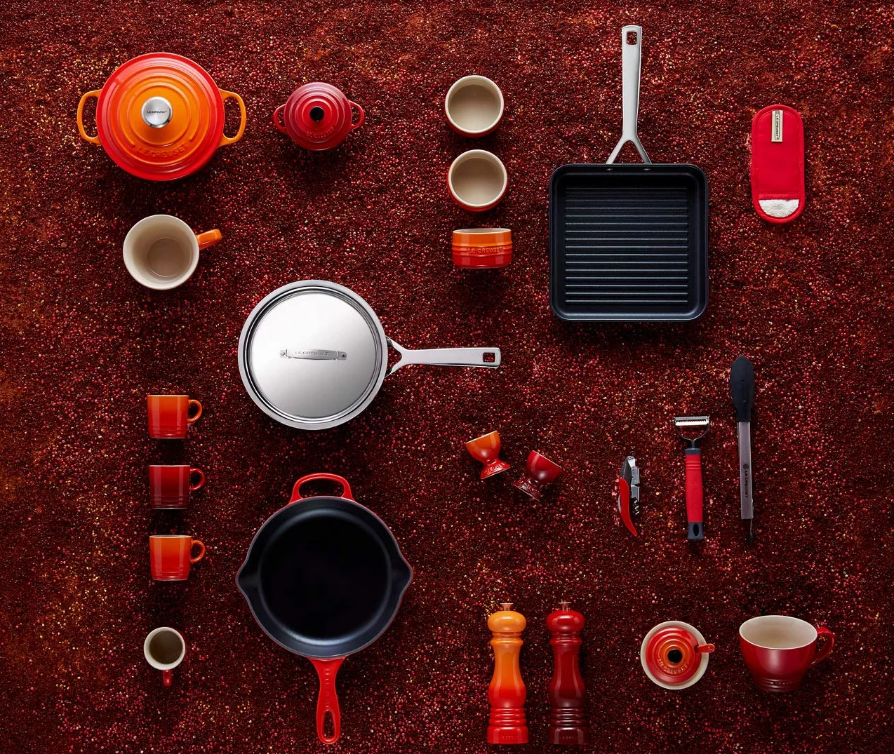Le Creuset 4-warstwowa tekstylna rękawica, odporna na plamy, czerwona