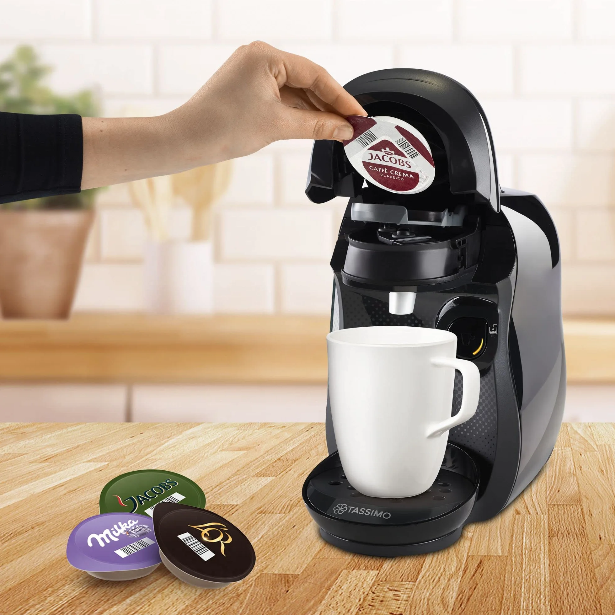 Tassimo Happy TAS1002N ekspres do kawy firmy Bosch, ponad 70 napojów, w pełni automatyczny, nadaje się do wszystkich filiżanek, zajmuje mało miejsca, 1400 W, czarny/antracyt